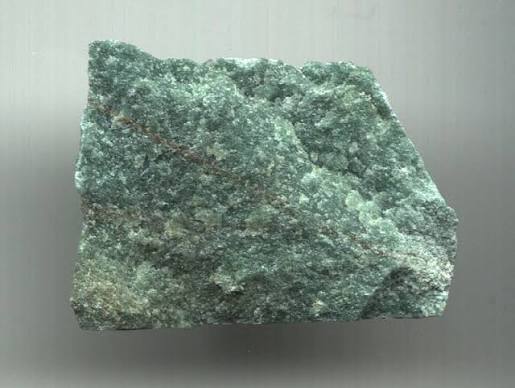 Polished green Aventurine with natural aventurescence and mineral inclusions