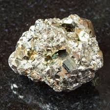 Natural Pyrite crystals showing metallic brass-yellow cubes